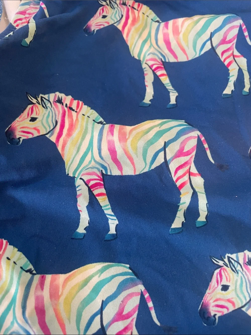 Hatley Navy One-Piece Swimsuit with Multicolor Zebra Print and Pink Tie Accents